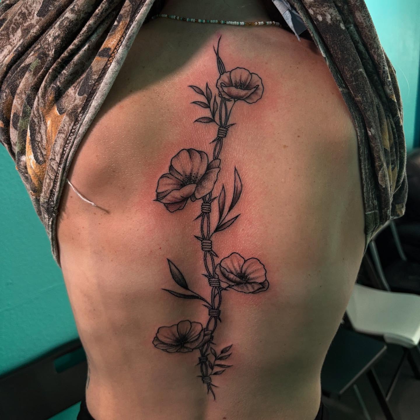 Abby back piece tattoo